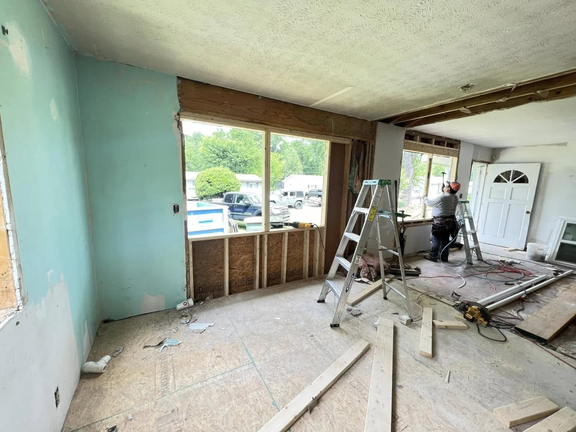 Interior demolition and window framing during a whole-home remodel